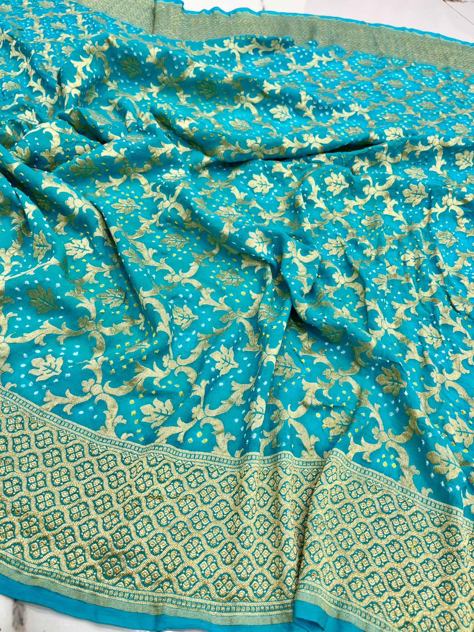 Choli Royal Shaded Banarasi Khaddi Georgette Bandhani Lehenga with Dupatta & Blouse, soft fabric and elegant design. Perfect for weddings & festive wear.